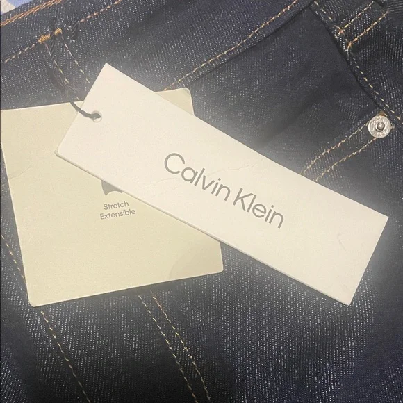 Calvin Klein High Rise Flared Jeans - Picture 5 of 7